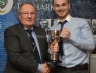 Eamonn McNeill recieves the Gerry Dalrymple Trophy for Senior Footballer of the Year from Danny McLernon.